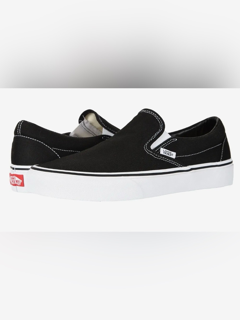 Vans Black Slip-On Sneakers with White Midsole